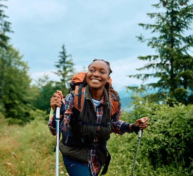young woman hiking on a mountain