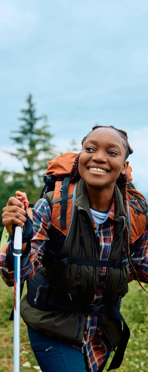 young woman hiking on a mountain